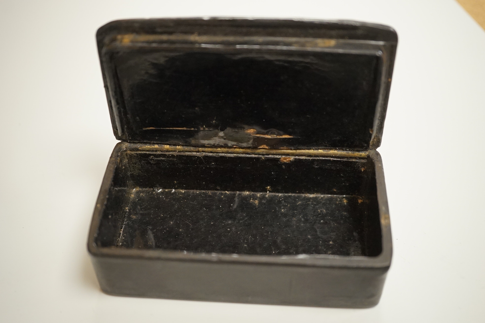 A collection of 19th century and later snuff and pill boxes, a silhouette frame and a gilt metal frame